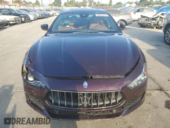 2018 Maserati Ghibli with VIN ZAM57XSA0J1286682, listed as a Copart auction lot 65457315 with 50,169 mi miles and Salvage title. Bid and sale history available at DreamBid. Image 5.