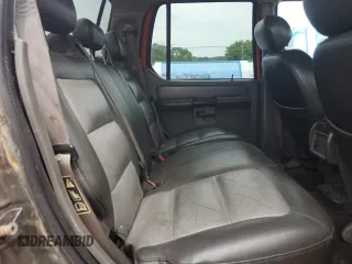 2004 Ford Explorer Sport Trac XLS z VIN 1FMDU77K94UA77644, wystawiony jako Copart lot #57495175 z przebiegiem Nie podano mil oraz Czysty tytuł • Clean title. Historia ofert i sprzedaży dostępna na DreamBid. Obrazek 10.