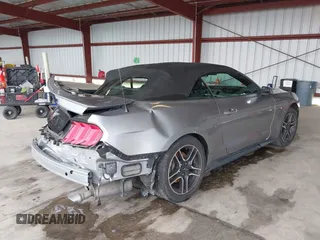 2021 Ford Mustang EcoBoost with VIN 1FATP8UH5M5122584, listed as a IAAI auction lot 40392031 with 71,732 mi miles. Bid and sale history available at carsss.com. Image 4.