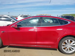 2018 Tesla Model S 75D with VIN 5YJSA1E26JF259651, listed as a IAAI auction lot 41690804 with Not Provided miles and . Bid and sale history available at DreamBid. Image 14.