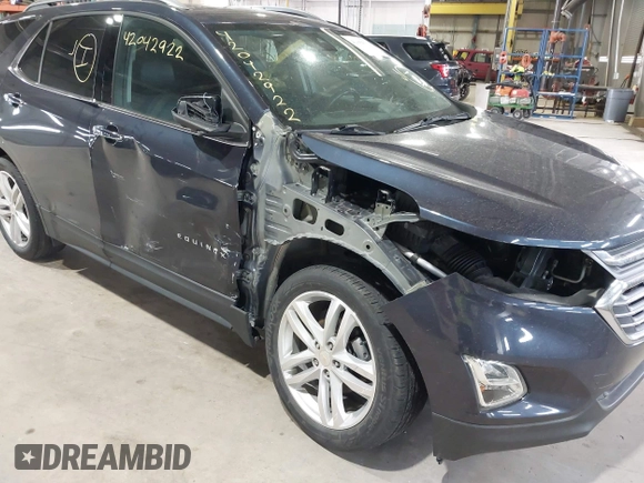2019 Chevrolet Equinox Premier z VIN 3GNAXNEVXKS500672, wystawiony jako IAAI lot #42042922 z przebiegiem 77 440 mil mil oraz . Historia ofert i sprzedaży dostępna na DreamBid. Obrazek 6.