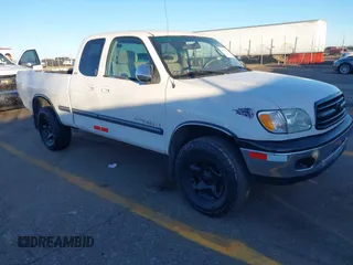 2002 Toyota Tundra SR5 with VIN 5TBRN34152S316287, listed as a IAAI auction lot 40972788 with 209,483 mi miles and . Bid and sale history available at DreamBid. Image 1.
