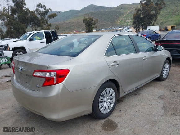2013 Toyota Camry Hybrid LE with VIN 4T1BD1FK7DU076272, listed as a IAAI auction lot 41886449 with 147,116 mi miles. Bid and sale history available at carsss.com. Image 4.