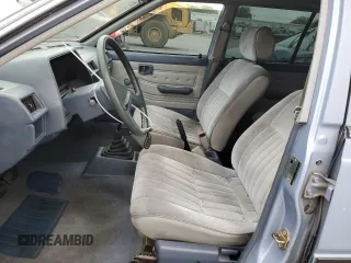 1985 Nissan Sentra z VIN JN1PB15S6FU172045, wystawiony jako Copart lot #54384475 z przebiegiem 134 117 mil mil oraz Szkody całkowita. Historia ofert i sprzedaży dostępna na DreamBid. Obrazek 7.