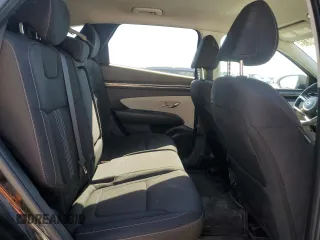 2023 Hyundai Tucson SEL z VIN 5NMJBCAEXPH284385, wystawiony jako Copart lot #53647035 z przebiegiem 22 571 mil mil oraz Szkoda całkowita • Salvage title. Historia ofert i sprzedaży dostępna na DreamBid. Obrazek 11.