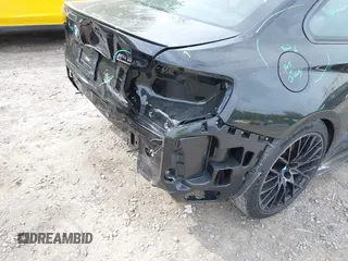 2021 BMW M2 Competition z VIN WBS2U7C05M7J18701, wystawiony jako IAAI lot #42256735 z przebiegiem 12 976 mil mil oraz . Historia ofert i sprzedaży dostępna na DreamBid. Obrazek 12.