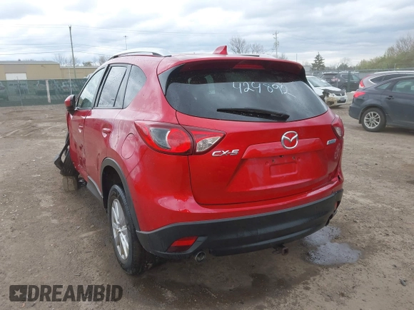 2014 Mazda CX-5 Touring z VIN JM3KE2CY3E0424892, wystawiony jako IAAI lot #42016801 z przebiegiem 173 350 mil mil oraz . Historia ofert i sprzedaży dostępna na DreamBid. Obrazek 16.