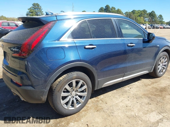 2019 Cadillac XT4 FWD Premium Luxury z VIN 1GYFZCR47KF109394, wystawiony jako IAAI lot #41864606 z przebiegiem 98 425 mil mil oraz . Historia ofert i sprzedaży dostępna na DreamBid. Obrazek 4.