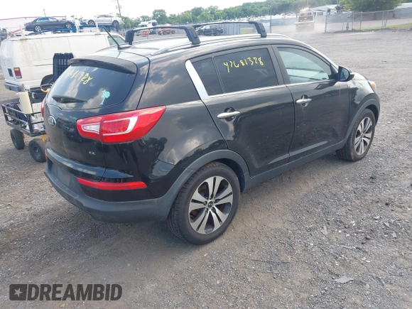 2013 Kia Sportage EX with VIN KNDPCCA23D7427564, listed as a IAAI auction lot 42681328 with 111,963 mi miles and . Bid and sale history available at DreamBid. Image 4.