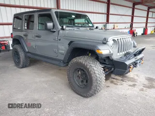 2021 Jeep Wrangler Unlimited Sport S z VIN 1C4HJXDG2MW542087, wystawiony jako IAAI lot #41893734 z przebiegiem 57 000 mil mil oraz . Historia ofert i sprzedaży dostępna na DreamBid. Obrazek 1.
