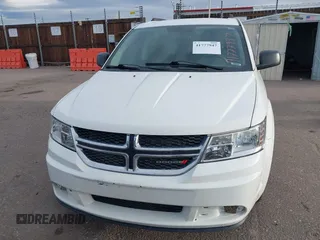 2017 Dodge Journey SE with VIN 3C4PDCAB6HT670624, listed as a IAAI auction lot 41777947 with 143,496 mi miles and . Bid and sale history available at DreamBid. Image 12.