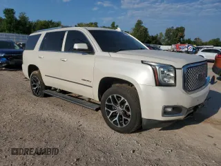 2015 GMC Yukon Denali with VIN 1GKS1CKJ0FR530006, listed as a Copart auction lot 66010184 with 140,292 mi miles and Clean Title. Bid and sale history available at carsss.com. Image 4.