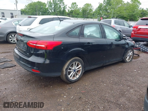 2017 Ford Focus SE z VIN 1FADP3F25HL253466, wystawiony jako IAAI lot #42303404 z przebiegiem 89 779 mil mil oraz . Historia ofert i sprzedaży dostępna na DreamBid. Obrazek 4.