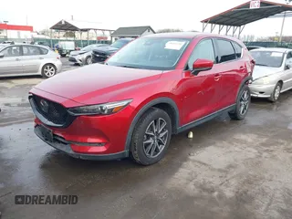2018 Mazda CX-5 Grand Touring with VIN JM3KFBDM8J0406276, listed as a IAAI auction lot 41447355 with 70,772 mi miles. Bid and sale history available at carsss.com. Image 2.