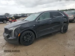 2023 Cadillac XT4 FWD Luxury with VIN 1GYAZAR45PF218684, listed as a Copart auction lot 54427565 with 74,920 mi miles and Salvage Title. Bid and sale history available at carsss.com. Image 1.
