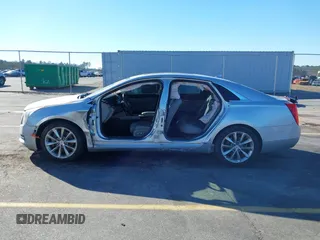 2013 Cadillac XTS Premium z VIN 2G61S5S35D9209252, wystawiony jako IAAI lot #41275066 z przebiegiem 132 311 mil mil oraz . Historia ofert i sprzedaży dostępna na DreamBid. Obrazek 15.