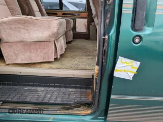 1997 GMC Safari z VIN 1GDDM19W5VB544214, wystawiony jako Copart lot #74226704 z przebiegiem Nie podano mil oraz Szkody całkowita. Historia ofert i sprzedaży dostępna na DreamBid. Obrazek 13.