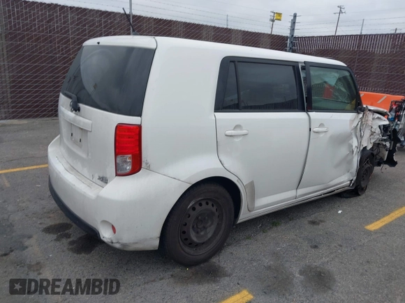 2014 Scion xB with VIN JTLZE4FEXEJ054060, listed as a IAAI auction lot 42096159 with 211,994 mi miles. Bid and sale history available at carsss.com. Image 4.