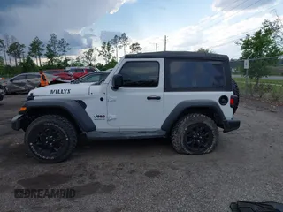 2022 Jeep Wrangler Sport S z VIN 1C4GJXAN9NW124190, wystawiony jako IAAI lot #42027247 z przebiegiem 8 376 mil mil oraz . Historia ofert i sprzedaży dostępna na DreamBid. Obrazek 14.