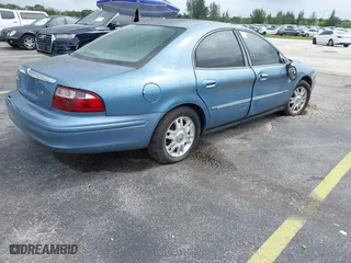 2005 Mercury Sable LS with VIN 1MEFM55S25A612965, listed as a IAAI auction lot 41988329 with 1 mi miles. Bid and sale history available at carsss.com. Image 4.