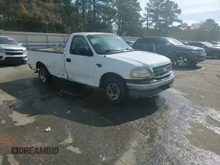 2003 Ford F-150 XL with VIN 1FTRF17W33NA54471, listed as a Copart auction lot 42594765 with 134,409 mi miles and Salvage Title. Bid and sale history available at DreamBid. Image 13.
