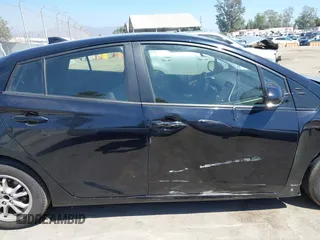 2020 Toyota Prius L Eco z VIN JTDKARFU1L3117772, wystawiony jako IAAI lot #40077005 z przebiegiem 71 892 mil mil oraz . Historia ofert i sprzedaży dostępna na DreamBid. Obrazek 13.