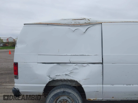 2006 Ford Econoline Cargo with VIN 1FTNE24W86DA21116, listed as a IAAI auction lot 42142204 with 133,272 mi miles and . Bid and sale history available at DreamBid. Image 12.