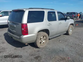 2007 Chevrolet Tahoe LT with VIN 1GNFK13087R165703, listed as a IAAI auction lot 42370222 with 150,014 mi miles and . Bid and sale history available at DreamBid. Image 4.