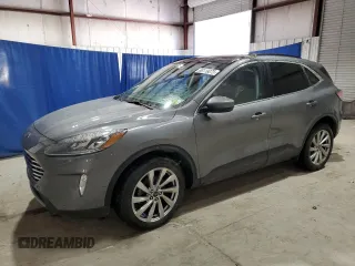 2021 Ford Escape Titanium with VIN 1FMCU9J94MUA78942, listed as a Copart auction lot 88119075 with 55,153 mi miles and Salvage Title. Bid and sale history available at carsss.com. Image 1.