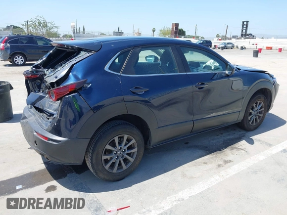 2021 Mazda CX-30 S with VIN 3MVDMAAL1MM270540, listed as a IAAI auction lot 42521513 with 63,993 mi miles and . Bid and sale history available at DreamBid. Image 4.