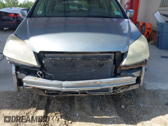 2007 Honda Odyssey EX-L z VIN 5FNRL38657B116038, wystawiony jako IAAI lot #42365429 z przebiegiem 177 518 mil mil oraz . Historia ofert i sprzedaży dostępna na DreamBid. Obrazek 6.