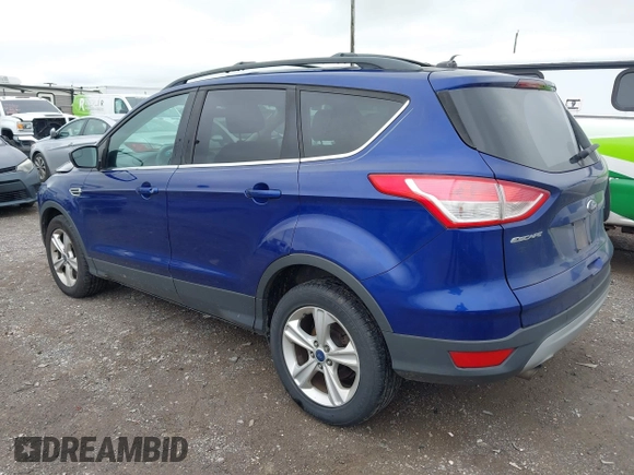 2013 Ford Escape SE with VIN 1FMCU9GX1DUD83174, listed as a IAAI auction lot 42509186 with 164,584 mi miles and . Bid and sale history available at DreamBid. Image 3.
