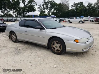 2002 Chevrolet Monte Carlo LS with VIN 2G1WW12E429365533, listed as a Copart auction lot 71433634 with 137,009 mi miles and Salvage Title. Bid and sale history available at carsss.com. Image 4.
