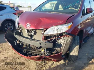 2014 Toyota Sienna XLE with VIN 5TDYK3DCXES473671, listed as a IAAI auction lot 42243030 with 70,052 mi miles and . Bid and sale history available at DreamBid. Image 6.
