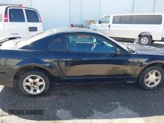 2004 Ford Mustang Standard with VIN 1FAFP40604F156534, listed as a IAAI auction lot 41794486 with 216,207 mi miles. Bid and sale history available at carsss.com. Image 14.