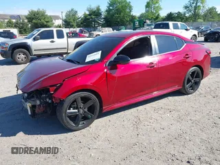 2021 Nissan Sentra SR z VIN 3N1AB8DV4MY229900, wystawiony jako IAAI lot #42222601 z przebiegiem 63 632 mil mil oraz . Historia ofert i sprzedaży dostępna na DreamBid. Obrazek 2.