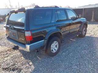 1997 Toyota 4Runner Limited with VIN JT3HN87R5V0077899, listed as a IAAI auction lot 41158201 with 332,243 mi miles. Bid and sale history available at carsss.com. Image 4.