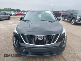 2020 Cadillac XT4 FWD Luxury z VIN 1GYAZAR4XLF146598, wystawiony jako IAAI lot #42211317 z przebiegiem 37 313 mil mil oraz . Historia ofert i sprzedaży dostępna na DreamBid. Obrazek 6.