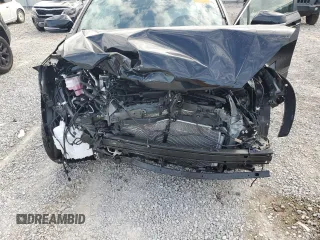 2024 Toyota Corolla Cross XLE with VIN 7MUEAABG2RV108218, listed as a Copart auction lot 54433915 with 7,091 mi miles and Salvage title. Bid and sale history available at DreamBid. Image 12.
