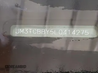 2020 Mazda CX-9 Sport z VIN JM3TCBBY5L0414275, wystawiony jako Copart lot #51858385 z przebiegiem 156 985 mil mil oraz Szkoda całkowita • Salvage title. Historia ofert i sprzedaży dostępna na DreamBid. Obrazek 13.