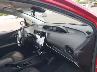 2021 Toyota Prius LE with VIN JTDL9MFU0M3029880, listed as a IAAI auction lot 42450003 with 91,558 mi miles and . Bid and sale history available at DreamBid. Image 5.