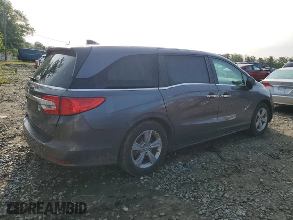 2019 Honda Odyssey EX with VIN 5FNRL6H58KB013889, listed as a Copart auction lot 57077025 with 126,467 mi miles and Salvage title. Bid and sale history available at DreamBid. Image 3.