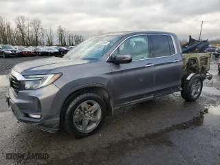 2021 Honda Ridgeline RTL-E with VIN 5FPYK3F74MB015036, listed as a Copart auction lot 43269105 with 64,631 mi miles and Salvage Title. Bid and sale history available at carsss.com. Image 1.