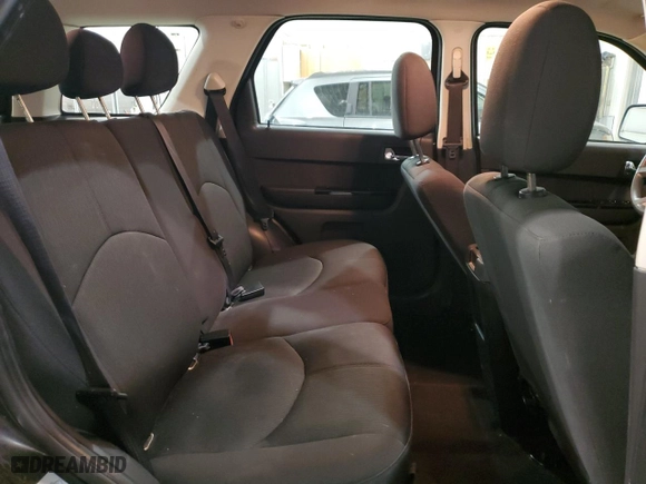 2011 Mazda Tribute Sport with VIN 4F2CY9C74BKM06583, listed as a Copart auction lot 49599745 with 153,464 mi miles and Salvage Title. Bid and sale history available at carsss.com. Image 11.