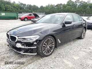 2017 BMW 5 Series 540i xDrive with VIN WBAJE7C34HG888689, listed as a Copart auction lot 59777605 with 44,233 mi miles and Salvage title. Bid and sale history available at DreamBid. Image 1.
