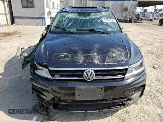 2021 Volkswagen Tiguan SE with VIN 3VV3B7AXXMM069410, listed as a Copart auction lot 58994325 with 55,846 mi miles and Salvage title. Bid and sale history available at DreamBid. Image 5.