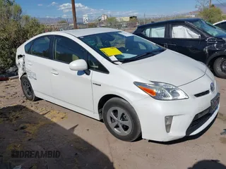2014 Toyota Prius Four z VIN JTDKN3DU5E0369436, wystawiony jako IAAI lot #42152826 z przebiegiem 189 159 mil mil oraz . Historia ofert i sprzedaży dostępna na DreamBid. Obrazek 1.