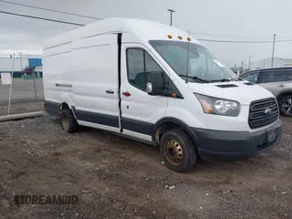 2018 Ford Transit z VIN 1FTBF4XM0JKA33058, wystawiony jako IAAI lot #42466767 z przebiegiem 172 858 mil mil oraz . Historia ofert i sprzedaży dostępna na DreamBid. Obrazek 1.