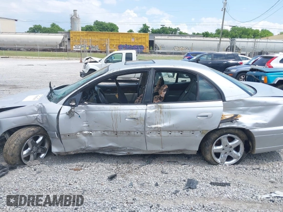 2000 Cadillac Catera z VIN W06VR54R0YR087456, wystawiony jako IAAI lot #42155135 z przebiegiem Nie podano mil oraz . Historia ofert i sprzedaży dostępna na DreamBid. Obrazek 14.