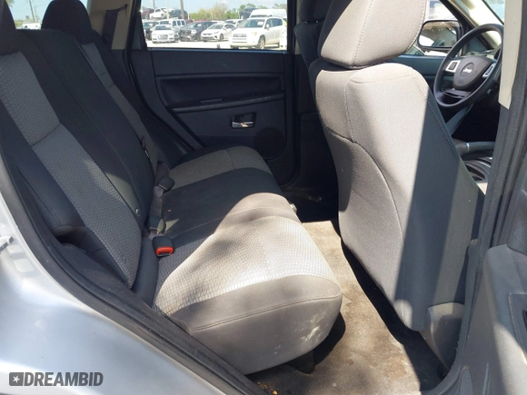 2010 Jeep Grand Cherokee Laredo with VIN 1J4PS4GK3AC163307, listed as a IAAI auction lot 41681527 with 155,464 mi miles. Bid and sale history available at carsss.com. Image 8.